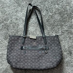 Coach grey and black fabric purse.